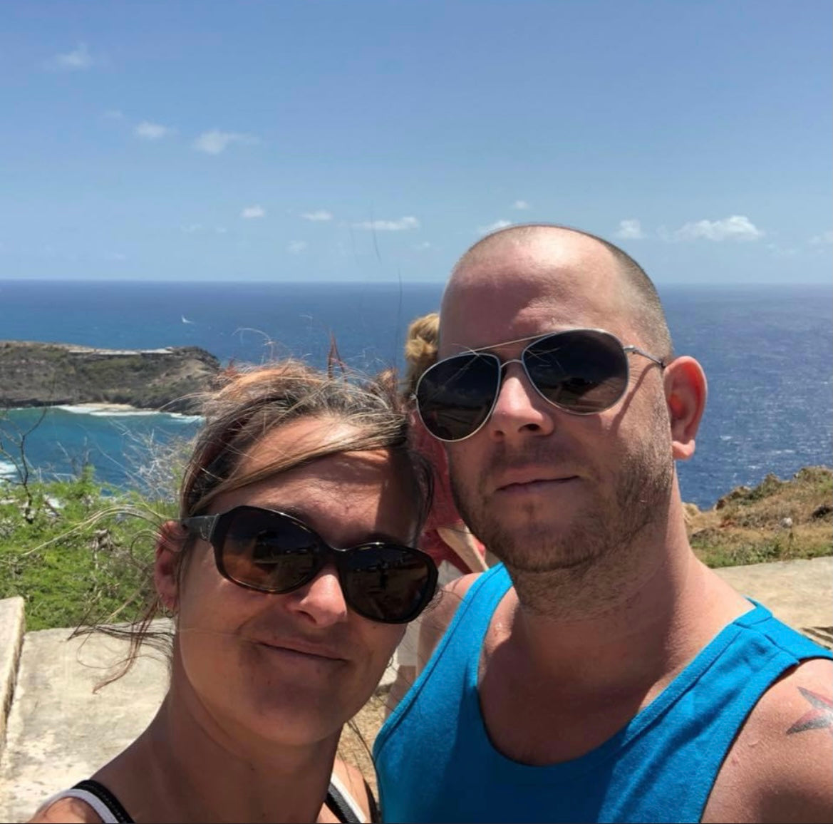 Selfie of June and Jaimie with a beach background